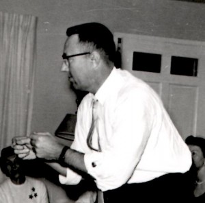 Dad playing charades in 1958