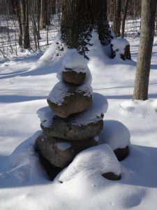 cairn in snow