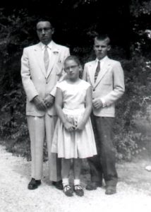 With our dad at our grandpa's funeral, 1955